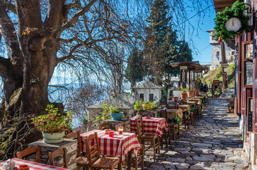 Traditional village of Makrinitsa with the stone built houses and the picturesque square, lies on...