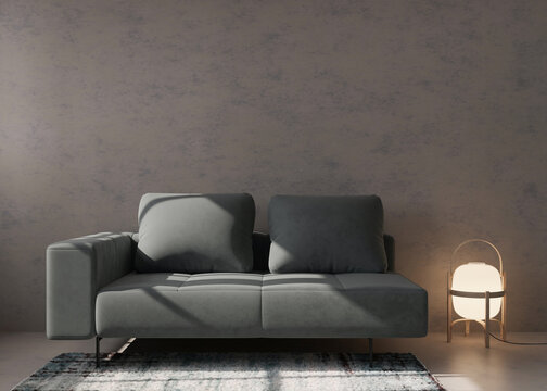 Empty concrete wall in modern living room. Mock up interior in minimalist, contemporary style. Free space, copy space for your picture, text, or another design. Gray sofa, lamp, carpet. 3D rendering.