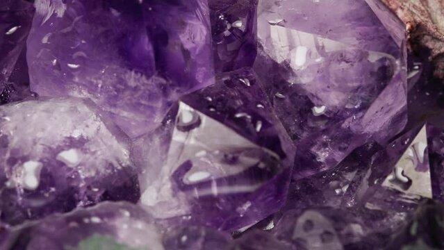 Macro purple texture and background with amethyst crystals.