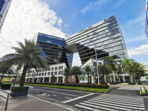 Pasay, Metro Manila, Philippines - Feb 2022: Two E-Com Center, a modern mid-rise office building at the Mall of Asia Complex.