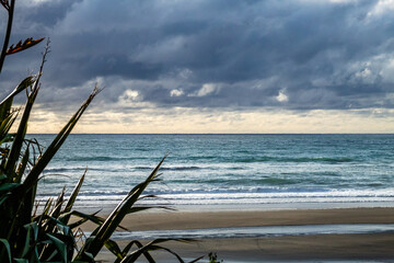 Waves and black sand highlight a visit to the beach. Taranaki, Beach, Taranaki, New Zealand