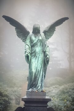 a angel in fog