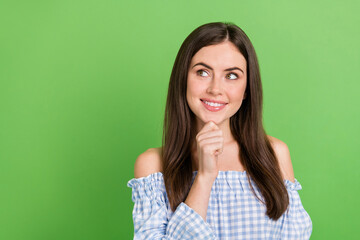 Fototapeta premium Portrait of adorable sweet lady look empty space brainstorming enjoying summer holiday isolated on green color background