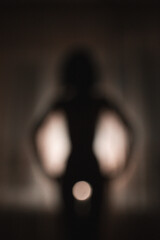 Female silhouette. Naked nature. Erotica. Art.