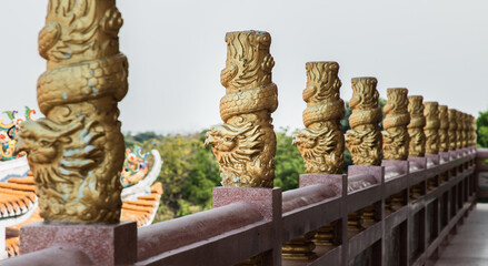 Chonburi, Thailand - 05 Feb 2022 : Column pillar at oriental golden hand rail on corridor in...