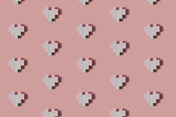 Creative pattern made of wooden block heart shapes. Love visual with pastel colors. Minimal flat...