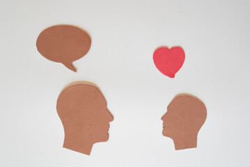 Heart and silhouette from eva paper, speech bubble.
World heart day, world mental health day, Alzheimer's and healthy lifestyle concept