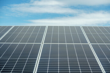 Field of solar panels to generate green and sustainable energy for the industries in the area.