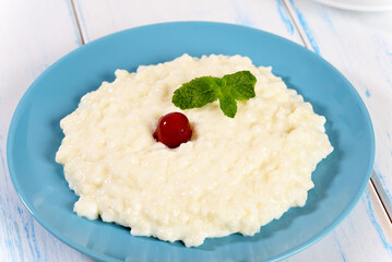 Rice milk porridge with cinnamon, healthy breakfast.