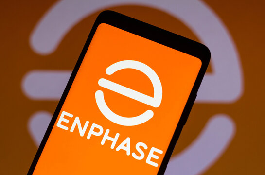 February 9, 2022, Brazil. In this photo illustration the Enphase Energy logo seen displayed on a smartphone and on the background.