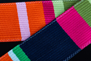 textile accessory or fabric drawn on a black background