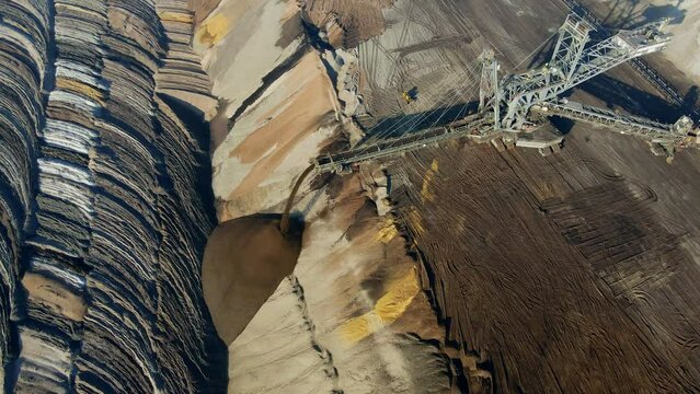 Mining equipment in a brown coal open pit mine near Garzweiler, Germany. Aerial View