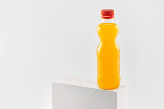 Orange Fizzy Drink In A Plastic Bottle Isolated On White Background