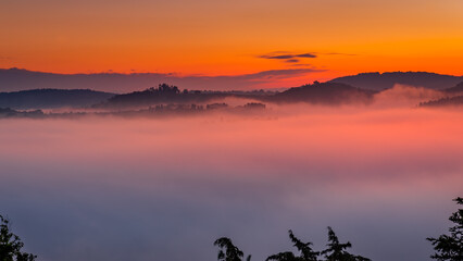 Obraz na płótnie Canvas Sunrise over Val d'Orcia in Tuscany