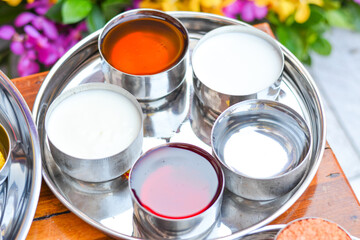 cans of paint and brush