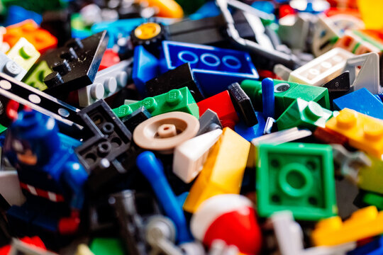 Valencia, spain - february 9, 2022: messy Lego pieces on the floor, detail.