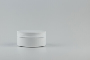 Skincare and cosmetology mockup. Unbranded white plastic jar for cosmetics products. Branding identity template for text and design