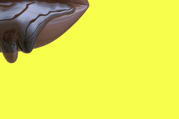 Chocolate icing on a yellow background