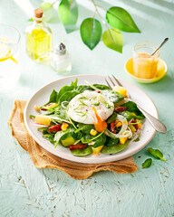Vegetable Salad with Poached Egg, spinach and sausage, chorizo.