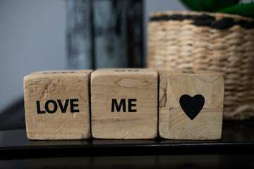 love me inscription on interior background