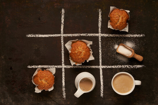 Edible Tic tac toe with muffins and coffee