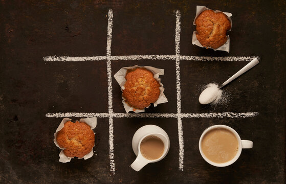 Edible Tic tac toe with muffins and coffee