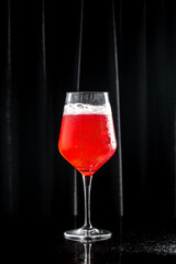 Cocktail Kir royal with champagne in glass with bubbles. drink, holidays party concept