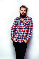 portrait of young bearded hipster guy smiling on white background close up isolated