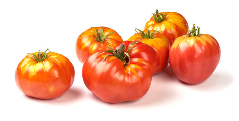 Fresh rustic tomatoes, isolated on white background.
