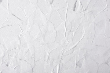 Obraz premium Abstract background of white crumpled paper.