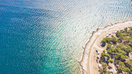 Aerial drone view of ocean sea coast at summertime tourist seaso
