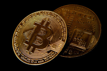 Cryptocurrency - Bitcoin stacked with a black background