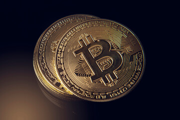 Cryptocurrency - Bitcoin stacked with a black background