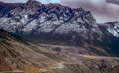 mountains in the snow, roaming fields below, should I stay or should I go?