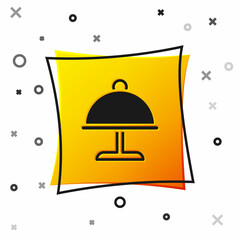 Black Covered with a tray of food icon isolated on white background. Tray and lid. Restaurant cloche with lid. Kitchenware symbol. Yellow square button. Vector