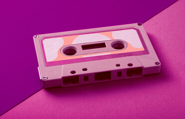 Old Vintage Audio Cassette, Compact Cassette, or Musicassette on a Seamless Trending Colorful...
