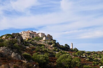 Fototapeta na wymiar Panoramic view of Sant Antonino, a picturesque hillside village in Balagne. Corsica, France.