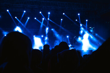 Concert. Spotlights on the stage with fog effect