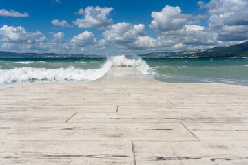 view of the raging sea and panoramic landscape from the sea pier