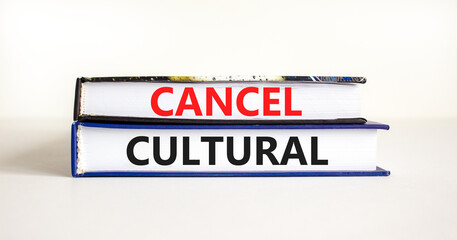 Cancel cultural symbol. Concept words Cancel cultural on books on a beautiful white table white background. Business and cancel cultural concept, copy space.