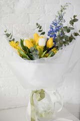 Beautiful spring yellow blue bouquet