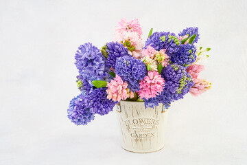 Pink and purple hyacinth bouquet in vase. Holiday background. Valentines Day, Mothers day concept.