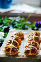 Floral hot cross buns.traditional easter pastries.
