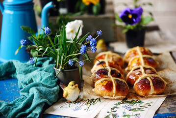 Floral hot cross buns.traditional easter pastries.