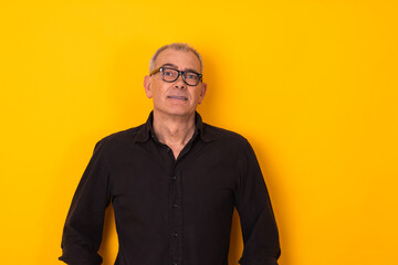 isolated man with glasses on color background