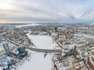 Yekaterinburg aerial panoramic view at Winter in cloudy day. Chelyuskintsev street and Railway Road Management building.