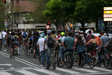 Fototapeta na wymiar Bicycle parade on a road in the middle of the city