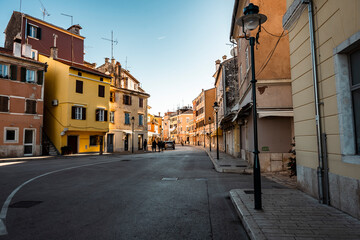 Naklejka na ściany i meble Rovinj city streets, popular tourist destination with beautiful, colorful houses in the Istrian region of Croatia