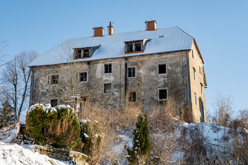 Old, abandoned house, covered in fresh snow at the town of Fuzine in the mountain region of Croatia