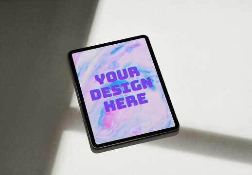 Tablet Mockup on a Concrete Surface with Hard Shadows